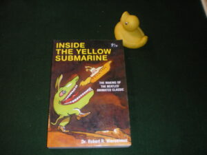 Inside The Yellow Submarine (1st edition) by Dr. Robert R. Hieronimus.  Krause Publications, 2002.
